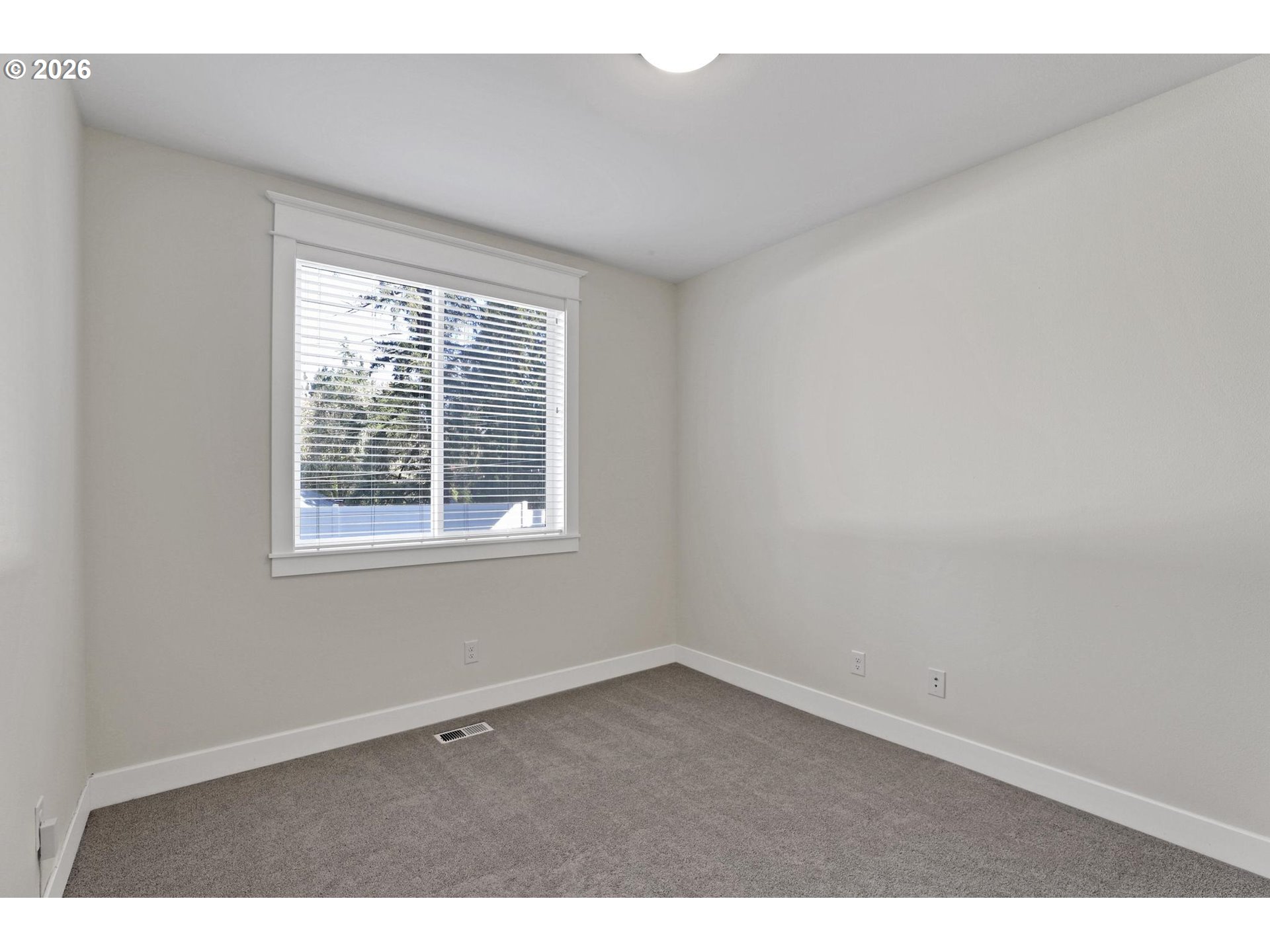 4022 Southeast Aldercrest Road Milwaukie, OR 97222 - Photo 29 of 40 a view of an empty room with a window