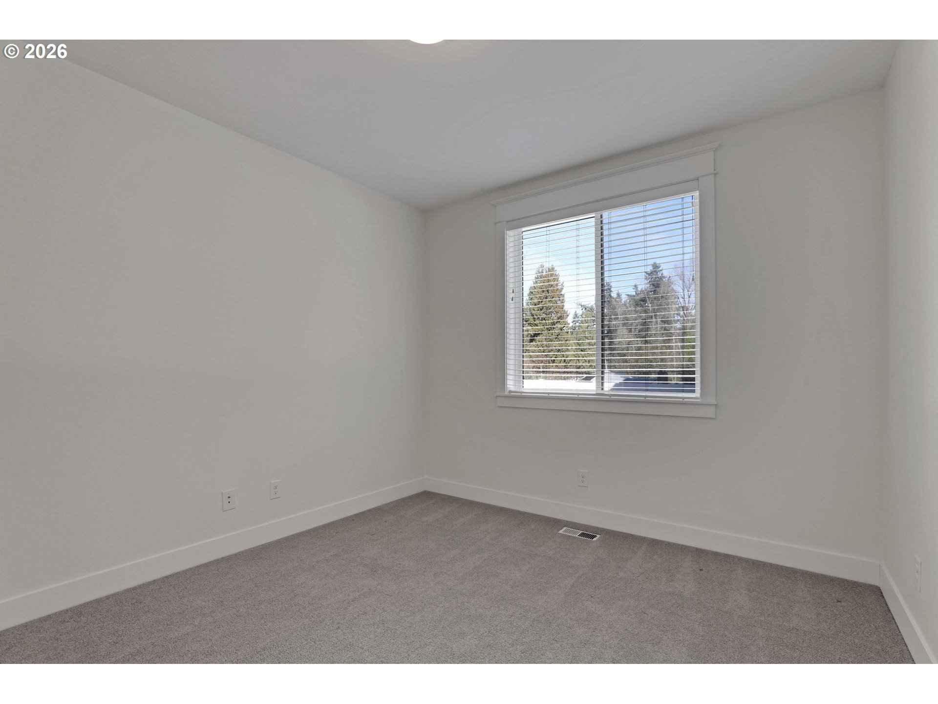 4022 Southeast Aldercrest Road Milwaukie, OR 97222 - Photo 30 of 40 a view of an empty room with a window