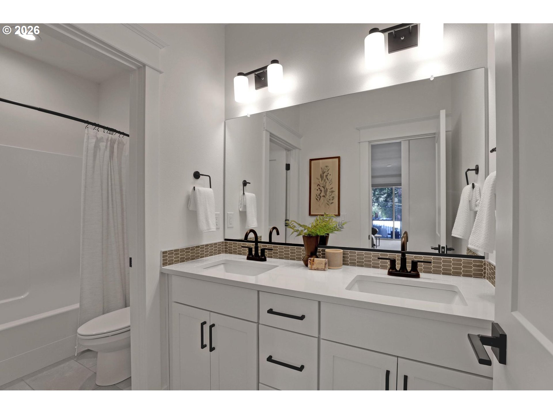 4022 Southeast Aldercrest Road Milwaukie, OR 97222 - Photo 31 of 40 a bathroom with a sink and a mirror