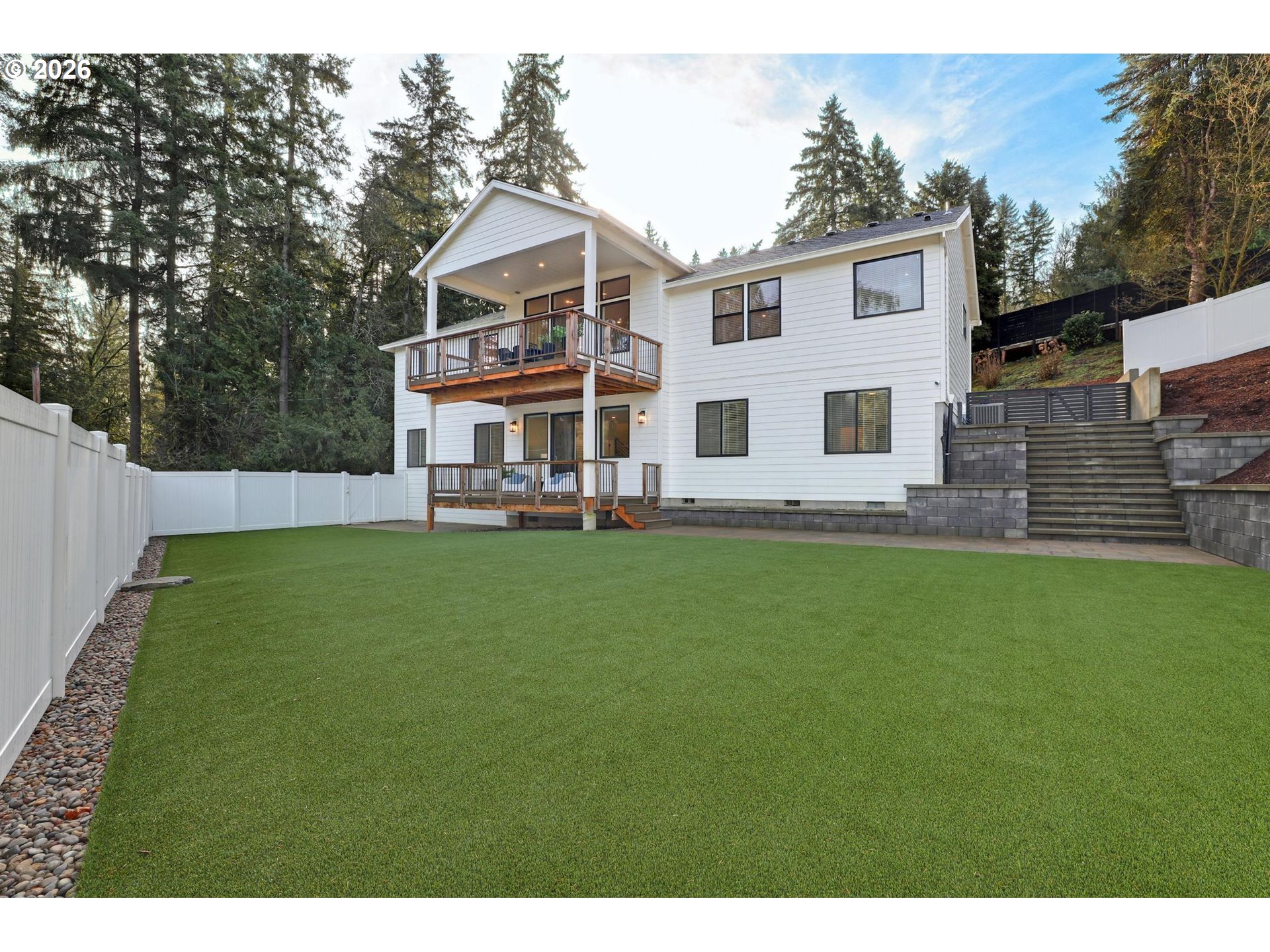 4022 Southeast Aldercrest Road Milwaukie, OR 97222 - Photo 34 of 40 a front view of a house with a garden and yard