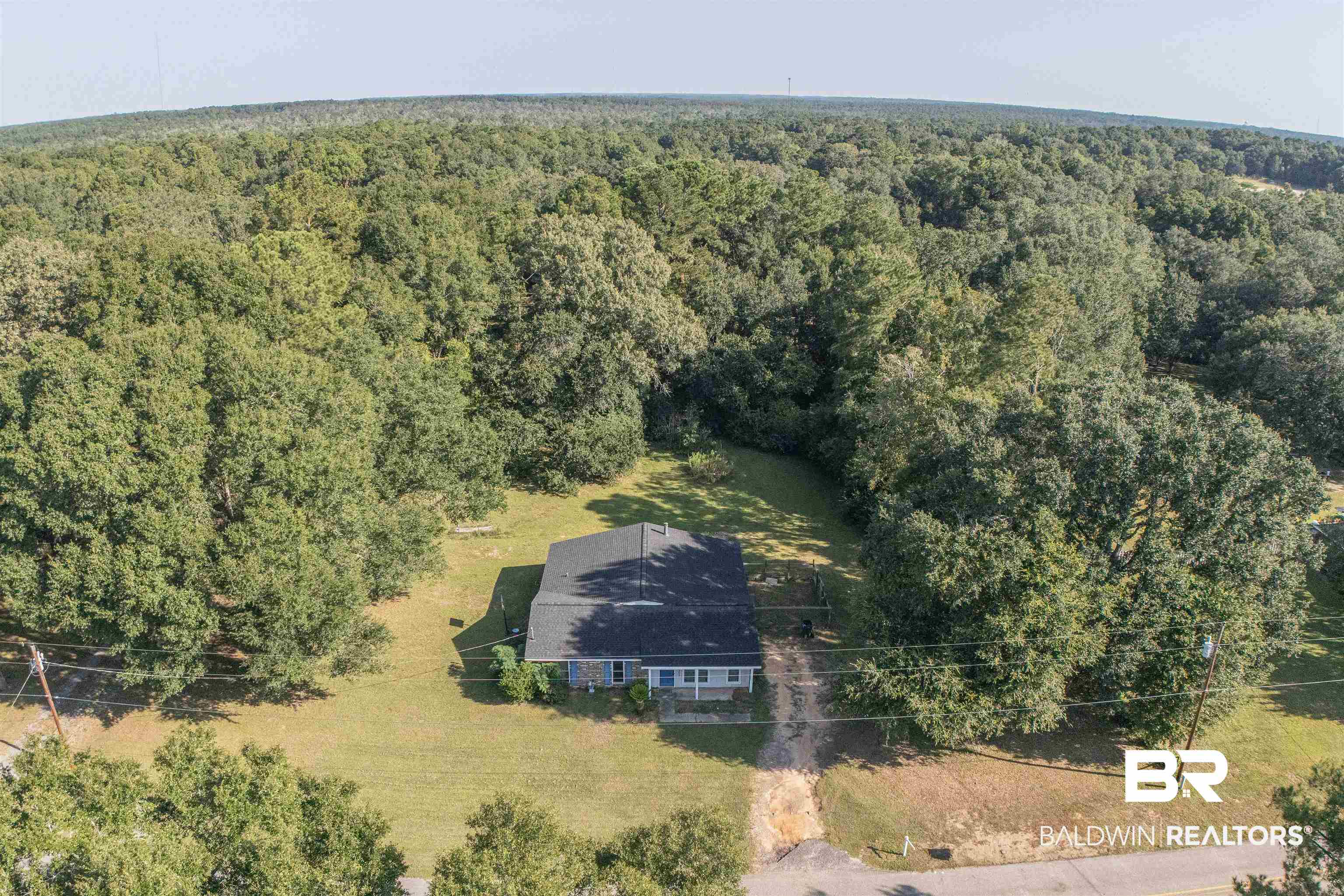 13393 J B Williams Road Loxley, AL 36551 - Photo 21 of 24 We are currently working on removing RV from lot.