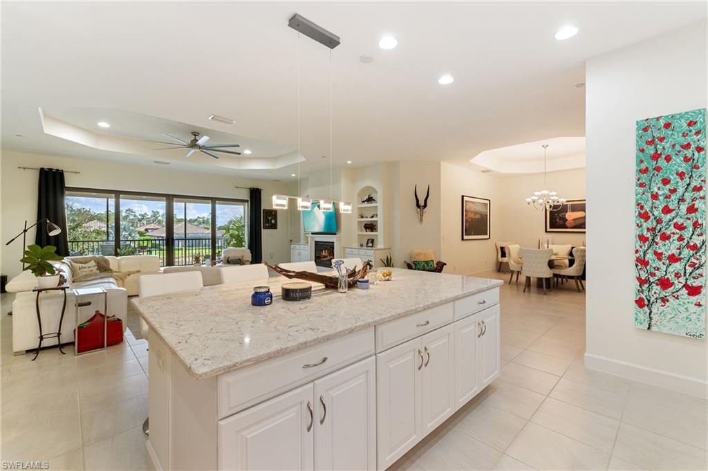 9653 Montelanico Loop, Unit 202 Naples, FL 34119 - Photo 14 of 45 a very nice looking living room with a large window