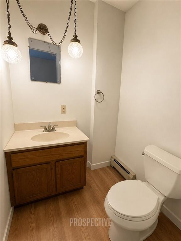215 Maple Street Kittanning, PA 16201 - Photo 14 of 39 a bathroom with a toilet a sink and mirror