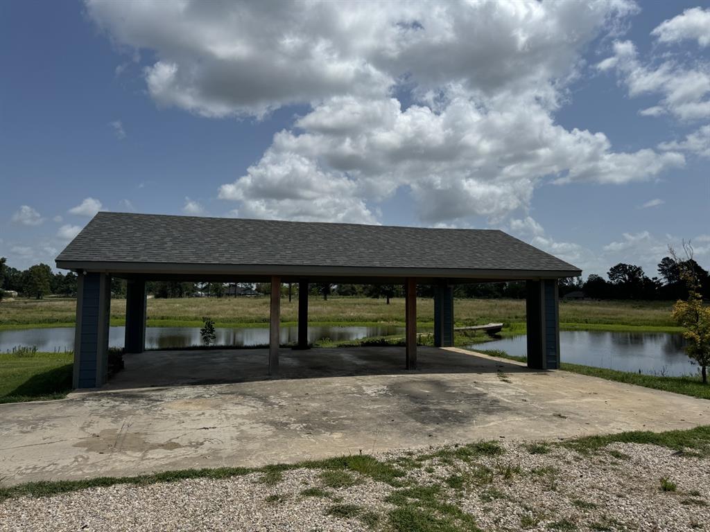 520 County Road Powderly, TX 75473 - Photo 3 of 24 View of dock featuring a gazebo and a water view