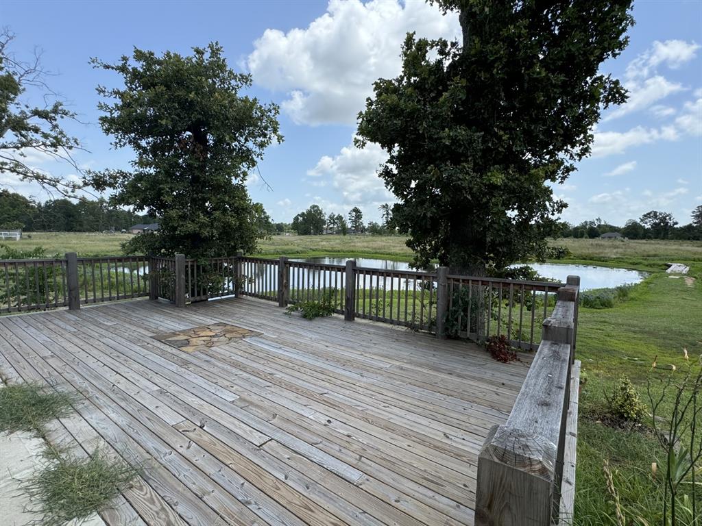 520 County Road Powderly, TX 75473 - Photo 6 of 24 Wooden terrace with a water view