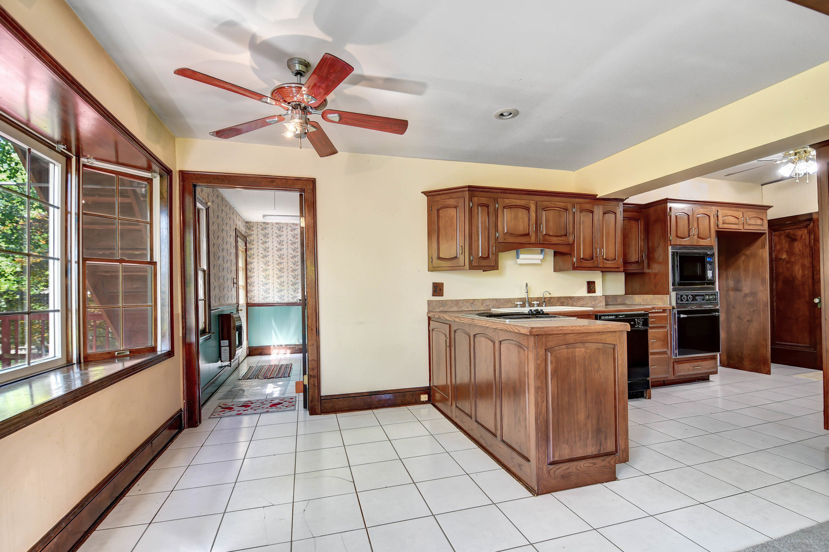 1578 Main Street Crete, IL 60417 - Photo 13 of 38 a open kitchen with stainless steel appliances granite countertop a refrigerator and a sink