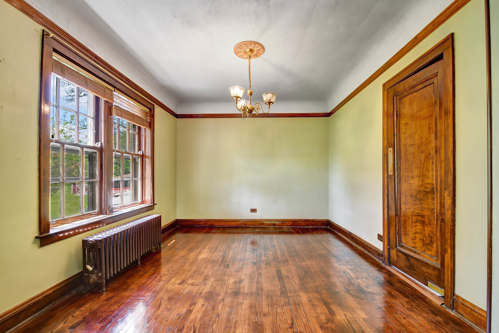 1578 Main Street Crete, IL 60417 - Photo 10 of 38 wooden floor in an empty room with a window