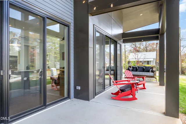 a room with glass door and glass door