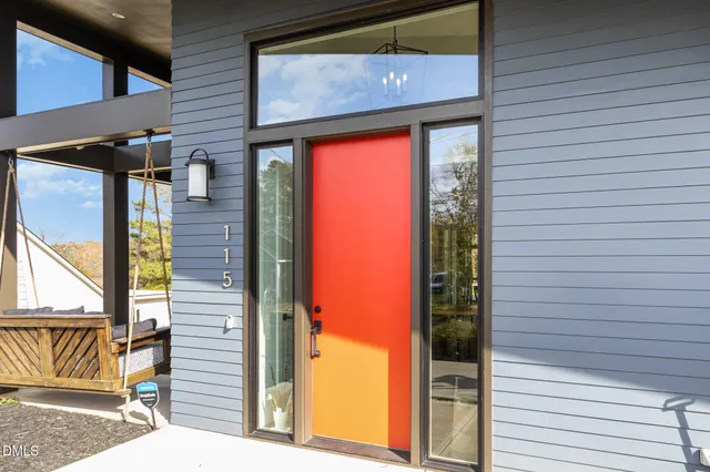 a view of a brick house with a large door