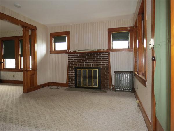 72 Edgemont Road Braintree, MA 02184 - Photo 4 of 11 an empty room with windows