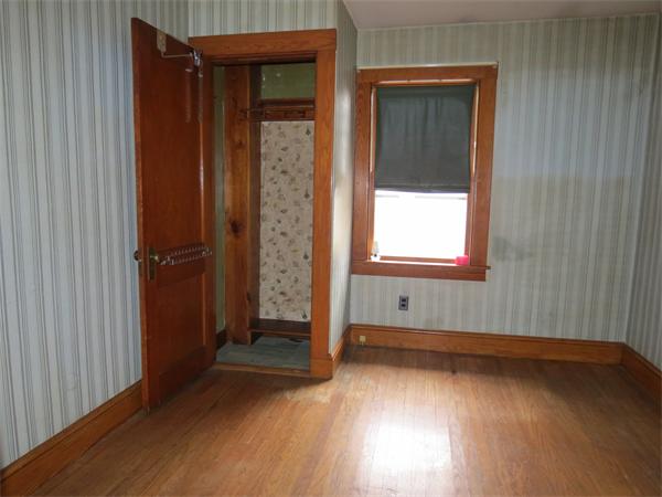 72 Edgemont Road Braintree, MA 02184 - Photo 7 of 11 an empty room with wooden floor and windows