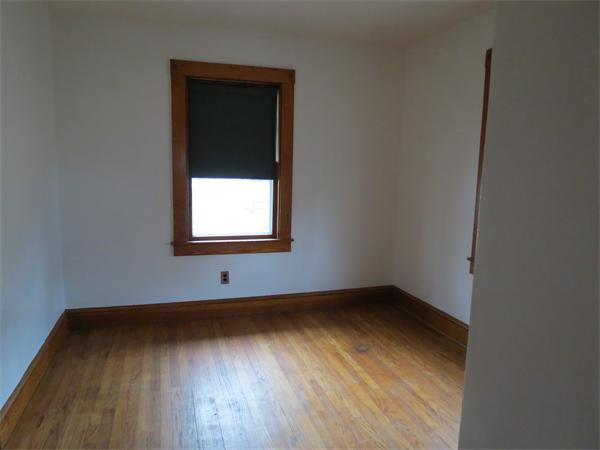 72 Edgemont Road Braintree, MA 02184 - Photo 8 of 11 a view of a small space with wooden floor and a window