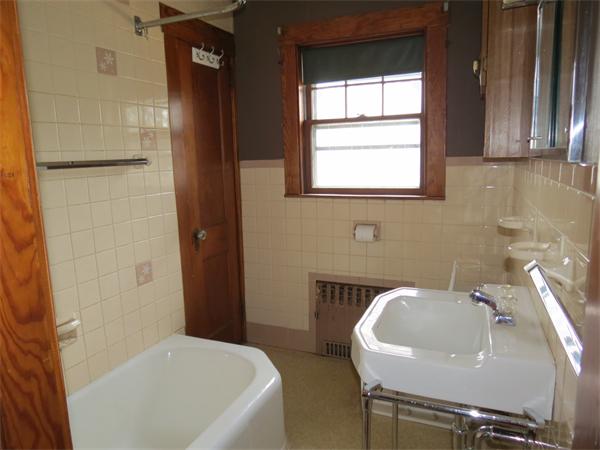 72 Edgemont Road Braintree, MA 02184 - Photo 9 of 11 a bathroom with a sink and a bathtub