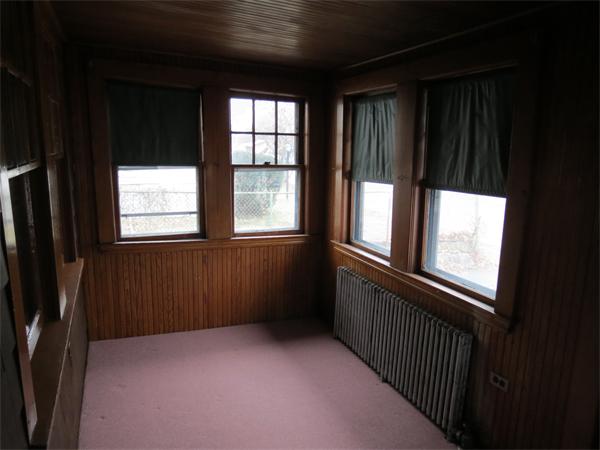 72 Edgemont Road Braintree, MA 02184 - Photo 10 of 11 a view of an empty room with a window