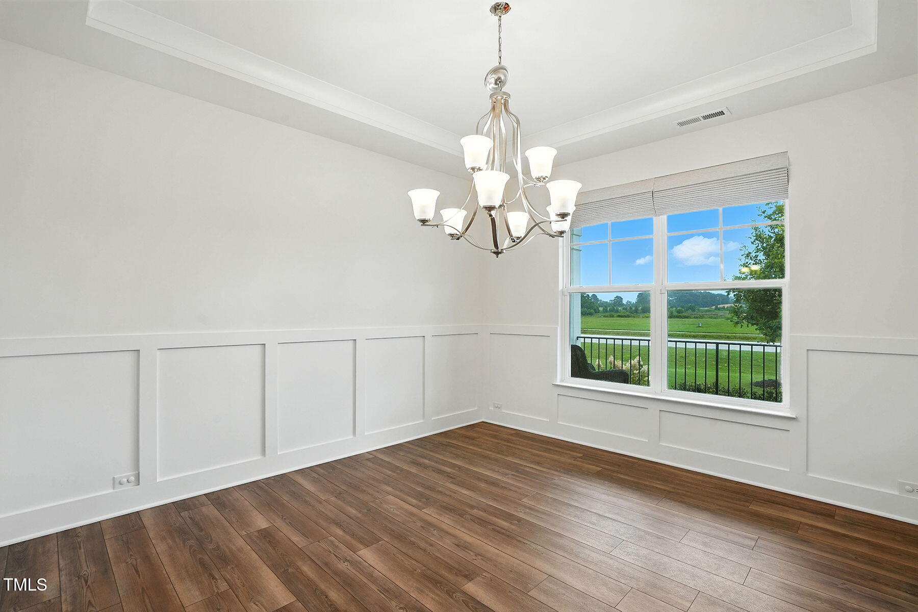 801 Mdw Frd Way Willow Spring, NC 27592 - Photo 11 of 36 a view of a chandelier in a room