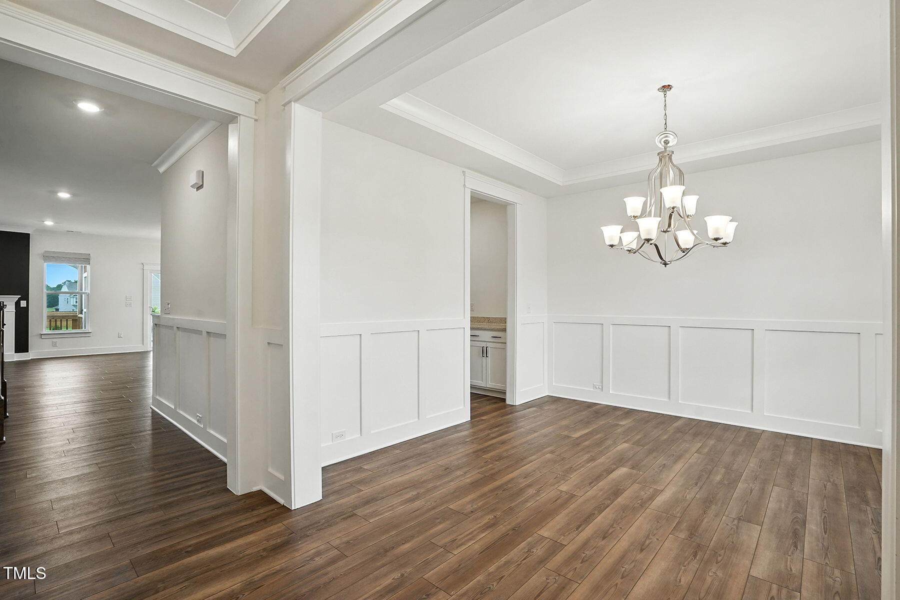 801 Mdw Frd Way Willow Spring, NC 27592 - Photo 12 of 36 a view of a livingroom with wooden floor
