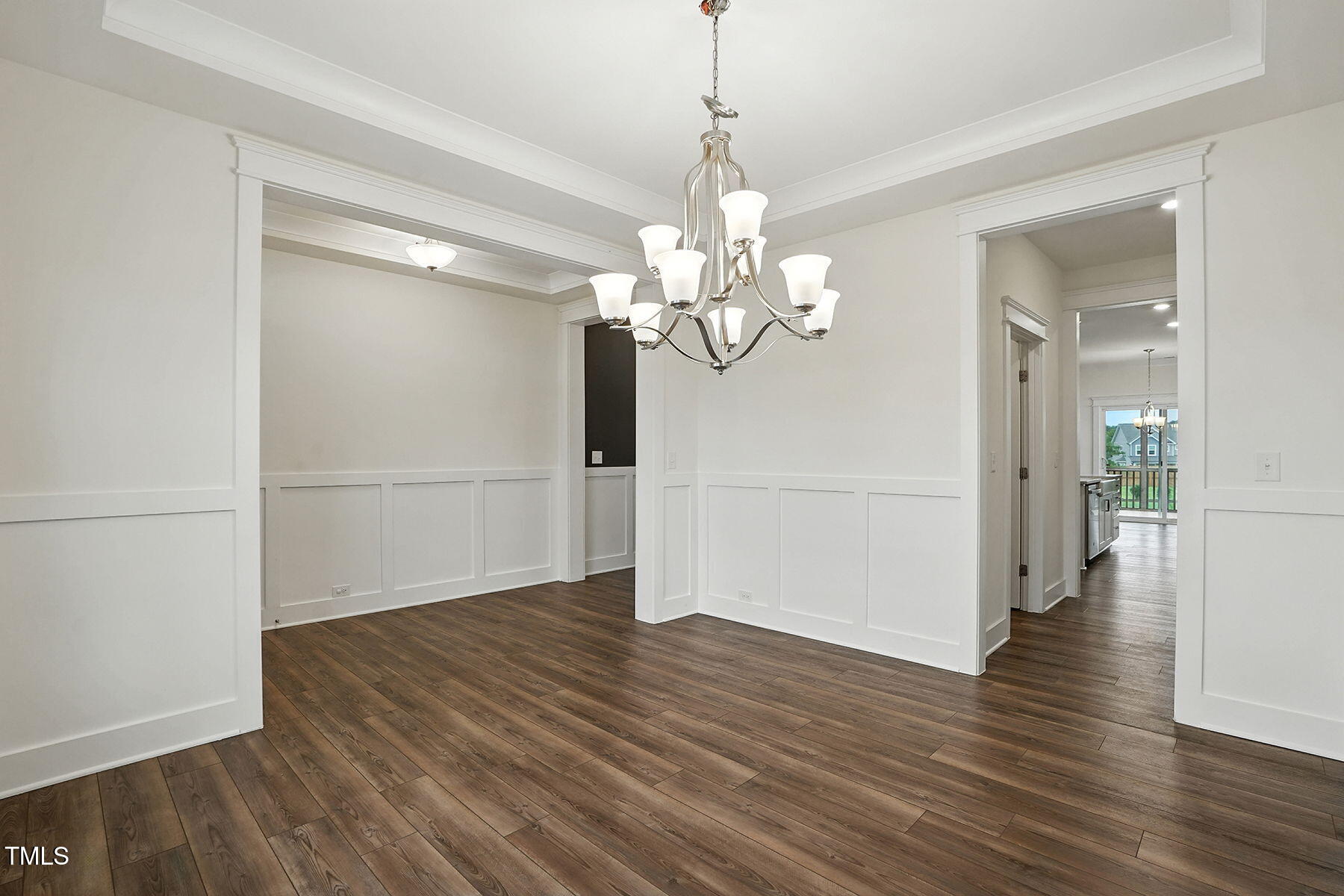 801 Mdw Frd Way Willow Spring, NC 27592 - Photo 13 of 36 a view of a livingroom with wooden floor