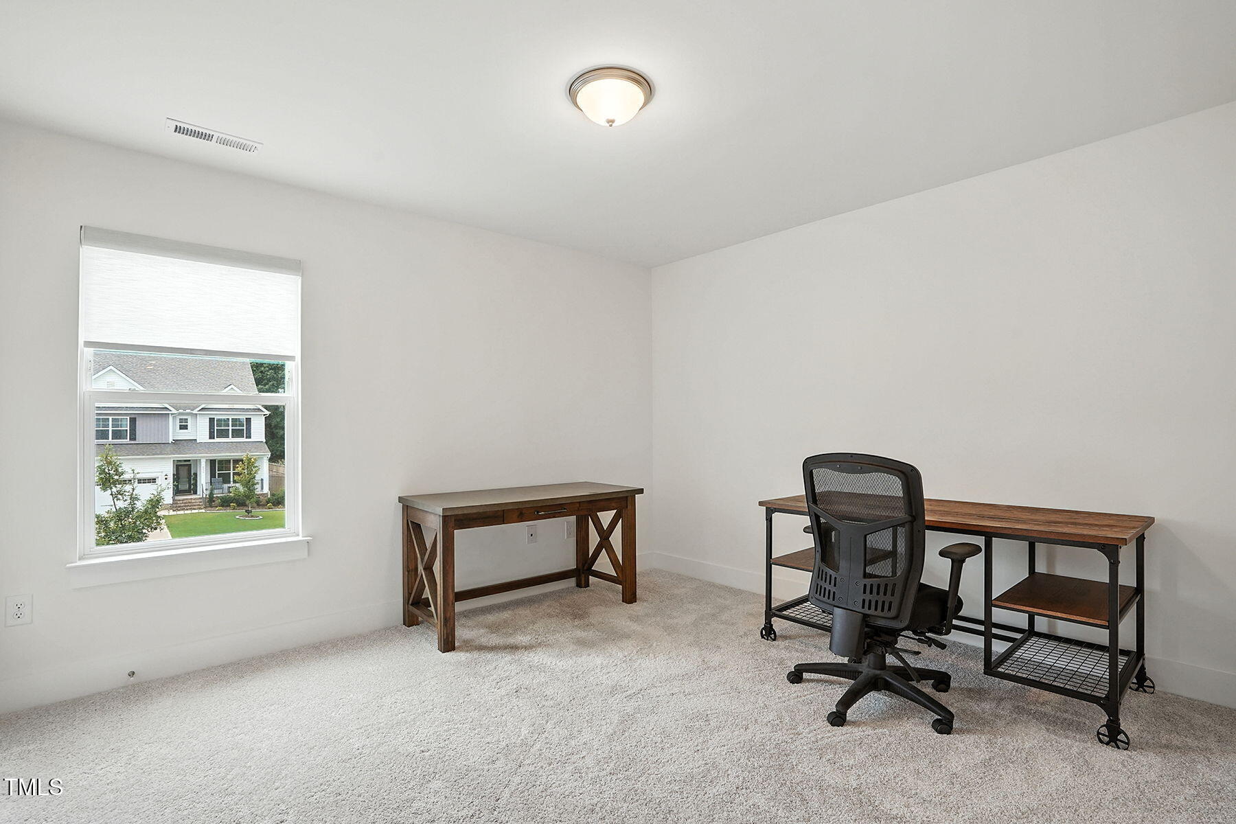 801 Mdw Frd Way Willow Spring, NC 27592 - Photo 21 of 36 a view of workspace with windows