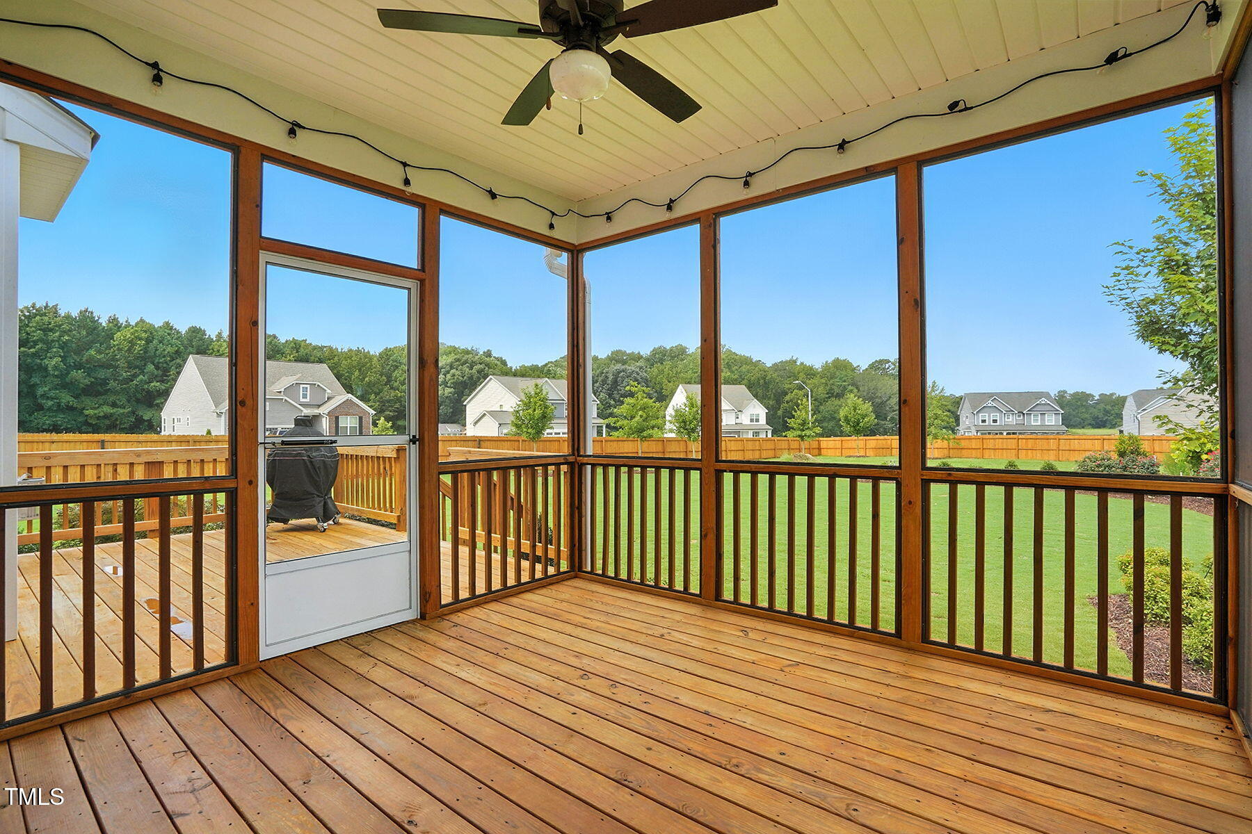801 Mdw Frd Way Willow Spring, NC 27592 - Photo 28 of 36 a view of a balcony with wooden floor