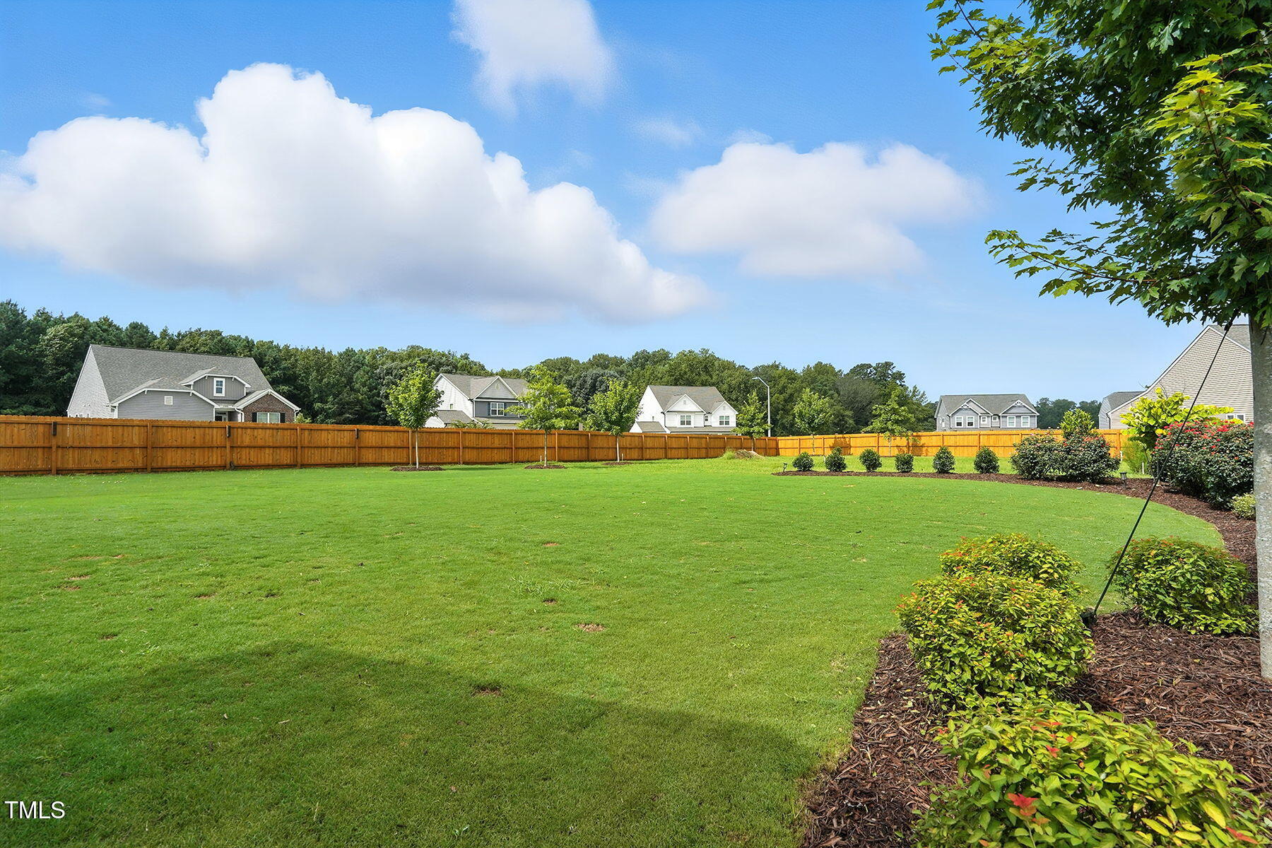 801 Mdw Frd Way Willow Spring, NC 27592 - Photo 29 of 36 a view of building with outdoor space
