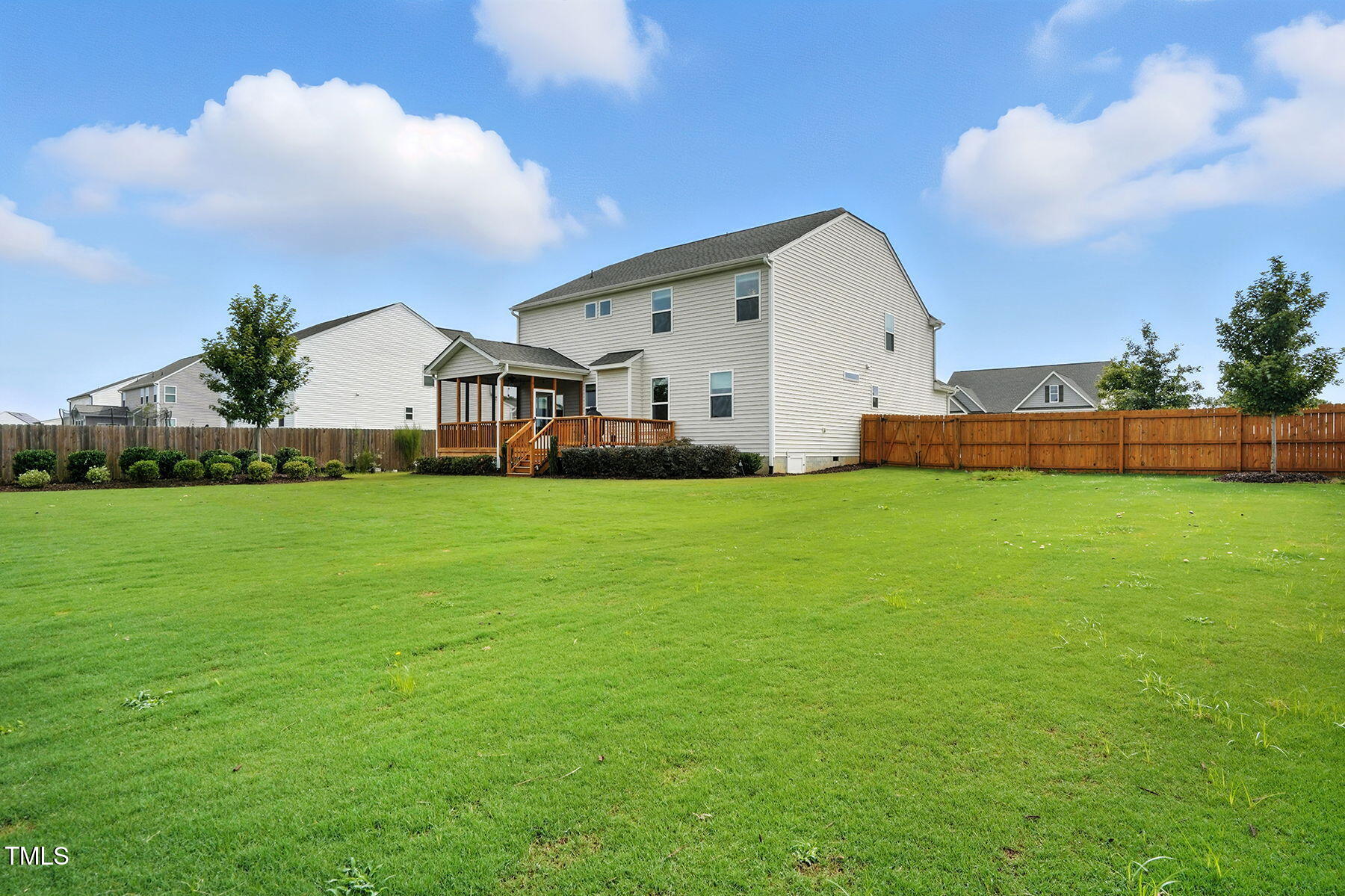 801 Mdw Frd Way Willow Spring, NC 27592 - Photo 30 of 36 a front view of house with yard and green space