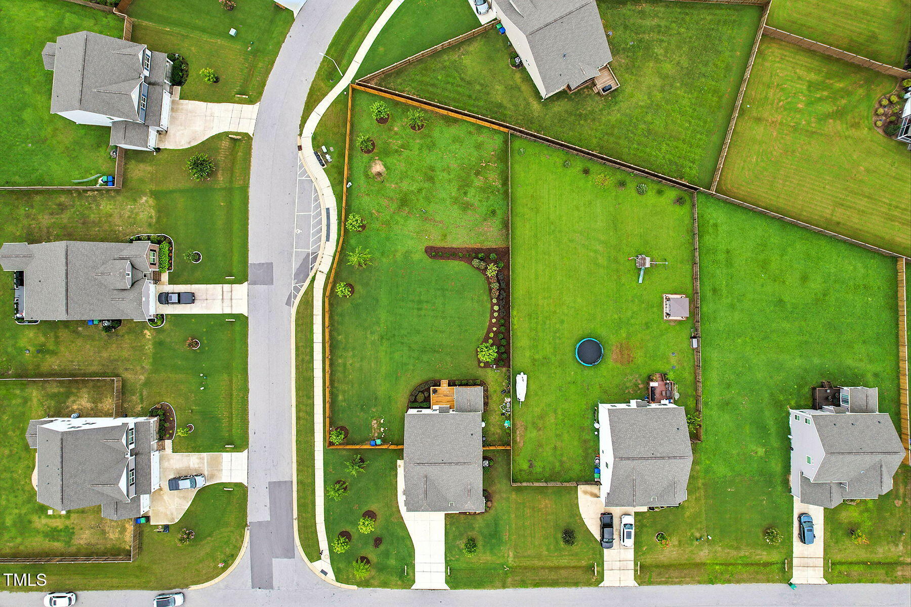 801 Mdw Frd Way Willow Spring, NC 27592 - Photo 32 of 36 an aerial view of a house having swimming pool