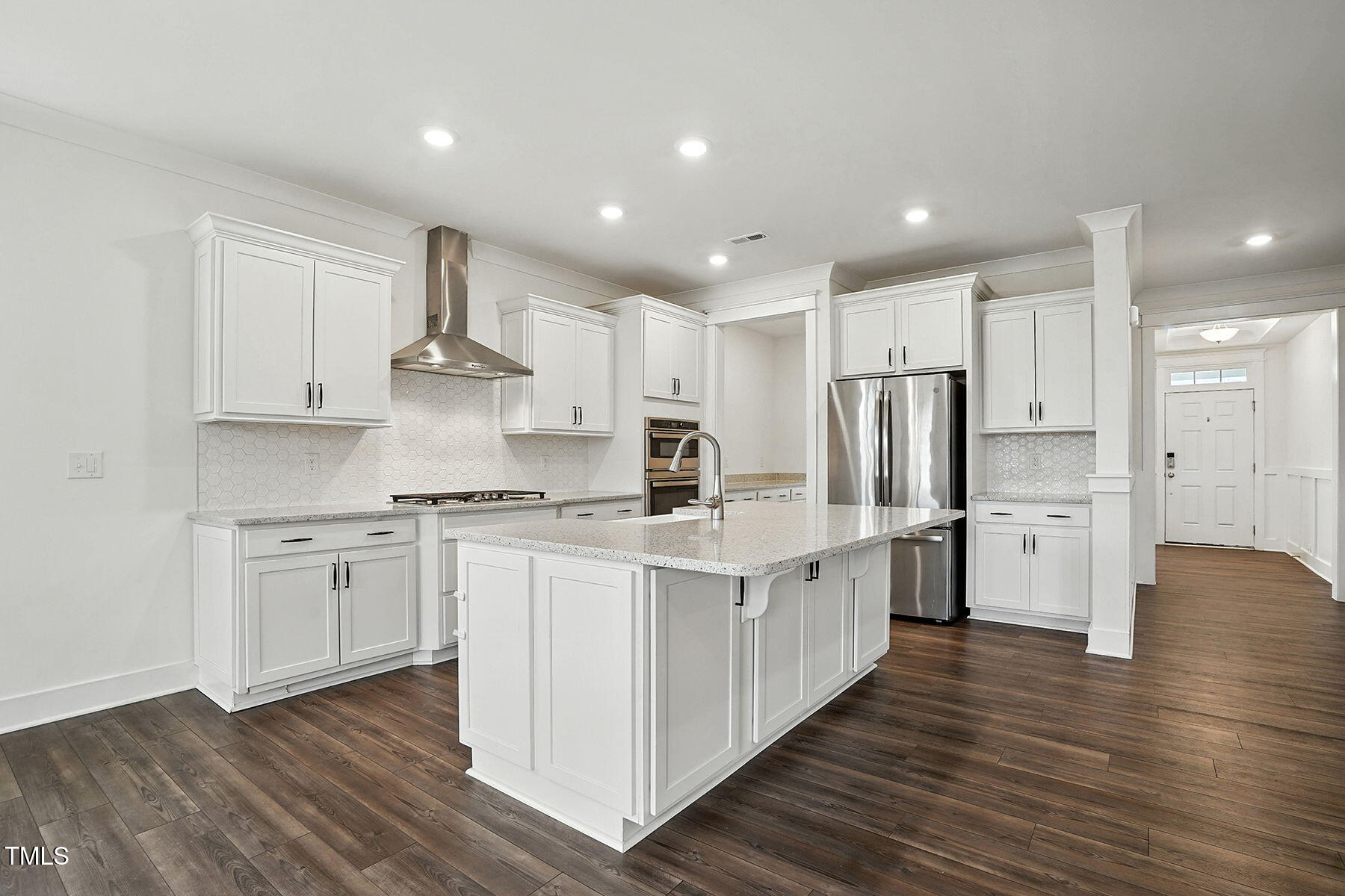801 Mdw Frd Way Willow Spring, NC 27592 - Photo 7 of 36 a kitchen with stainless steel appliances sink refrigerator and cabinets