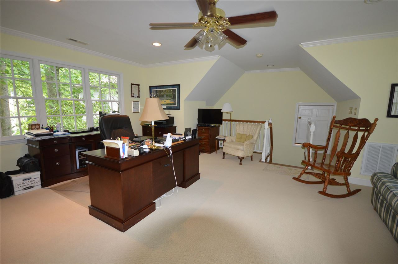2929 Buckingham Road Durham, NC 27707 - Photo 13 of 26 a living room with furniture and a large window