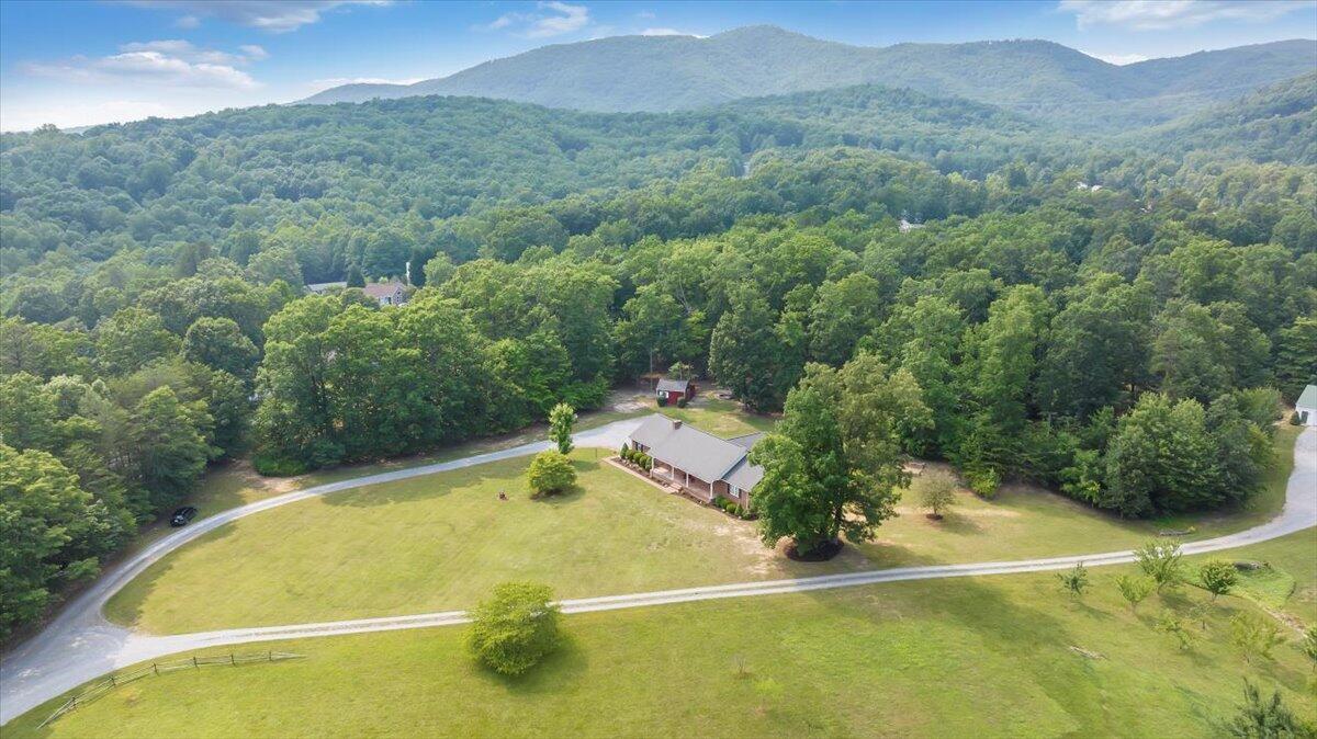 744 Leonard Farm Road Blue Ridge, VA 24064 - Photo 54 of 68 a view of a pool with a yard