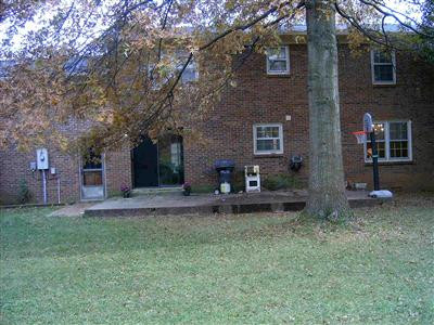 Back view with large patio.