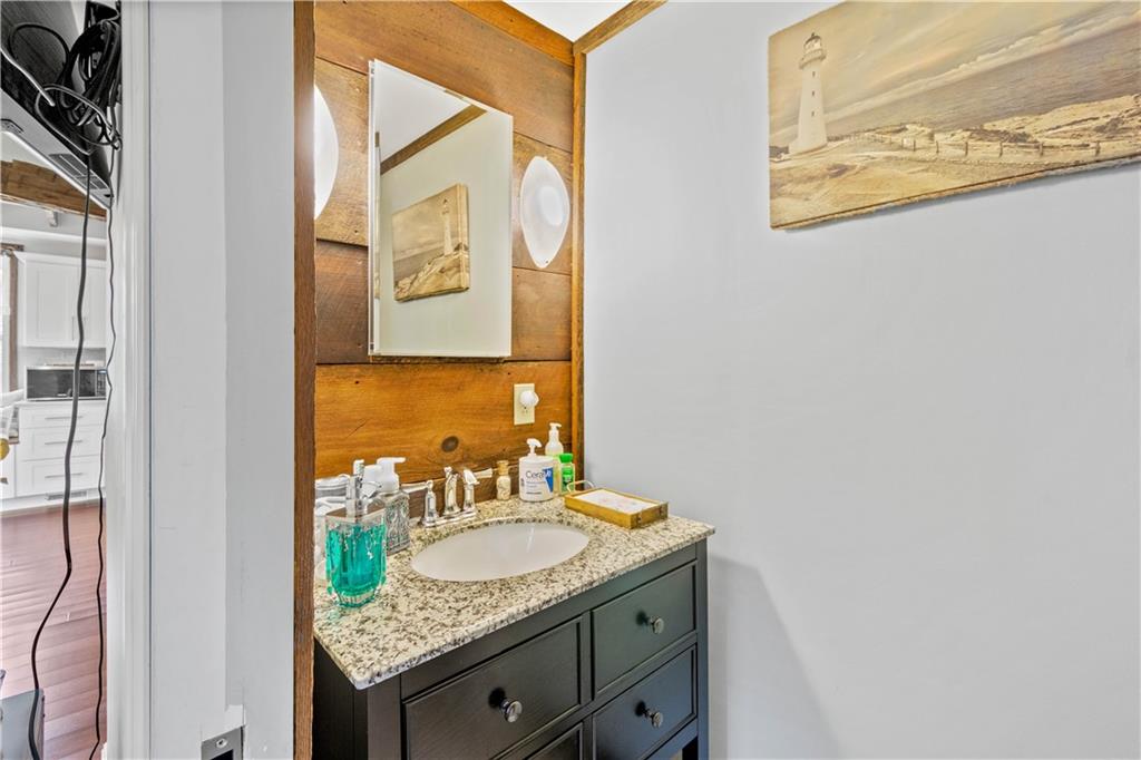 207 Redd Run Road Washington, PA 15301 - Photo 12 of 25 a bathroom with a granite countertop sink and a mirror
