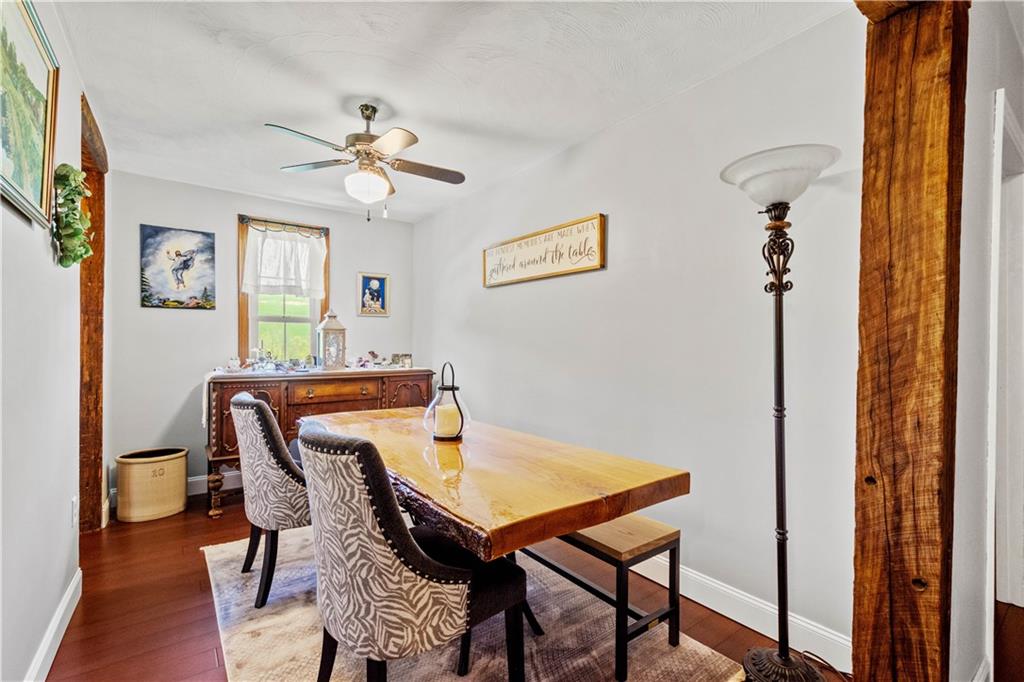 207 Redd Run Road Washington, PA 15301 - Photo 19 of 25 a view of a dining room with furniture and a chandelier