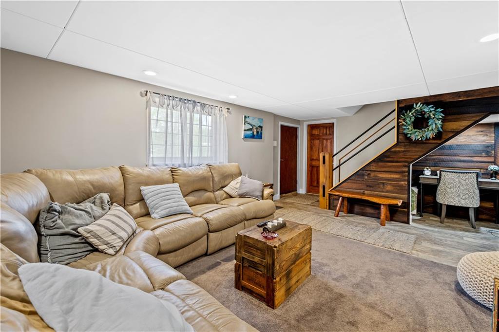 207 Redd Run Road Washington, PA 15301 - Photo 23 of 25 a living room with furniture and a ceiling fan