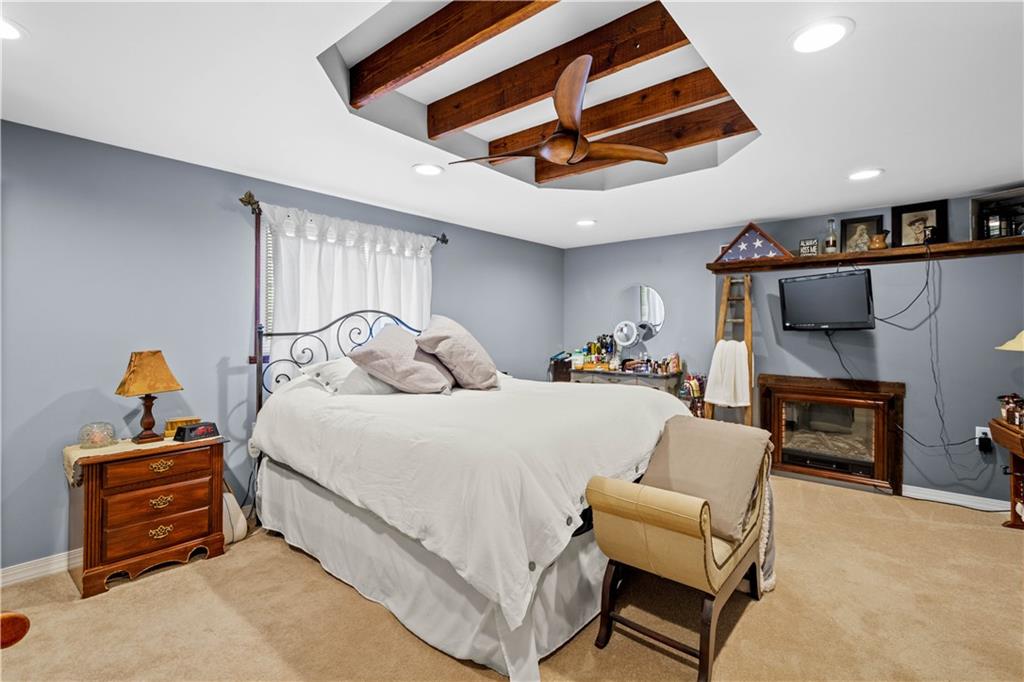 207 Redd Run Road Washington, PA 15301 - Photo 24 of 25 a bedroom with furniture and a chandelier