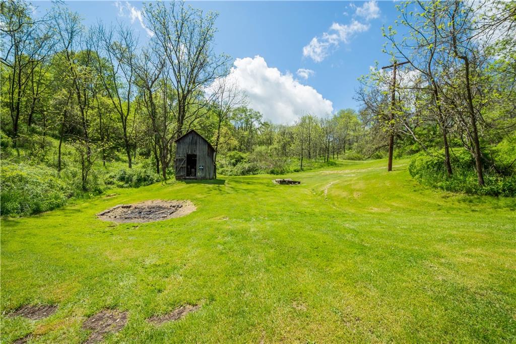 207 Redd Run Road Washington, PA 15301 - Photo 5 of 25 a view of a backyard with green space