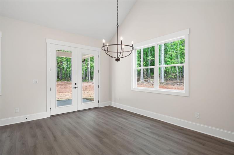 110 Doris Path Temple, GA 30179 - Photo 13 of 35 a view of an empty room with wooden floor and a window