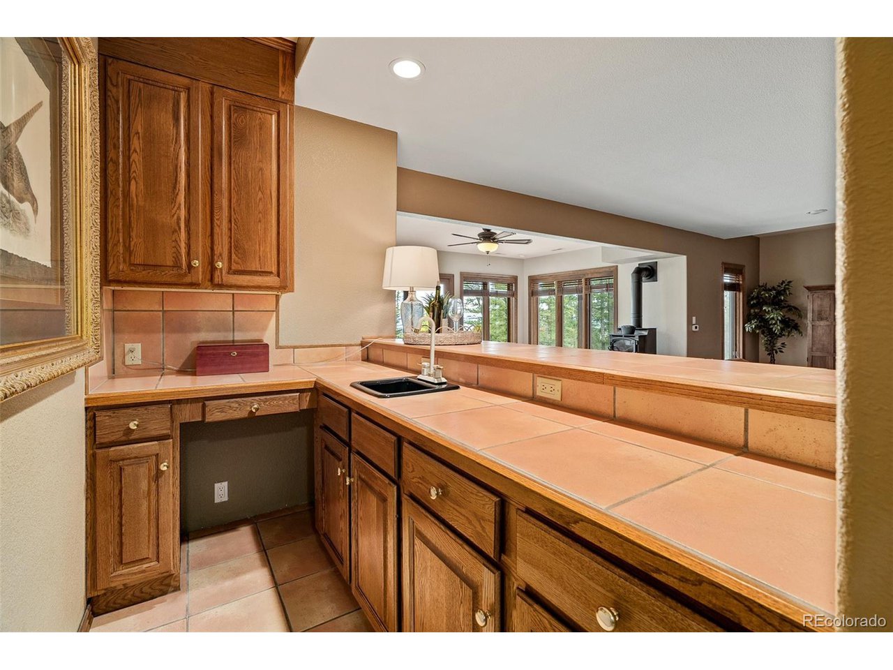 2755 Elk Ridge Divide Divide, CO 80814 - Photo 28 of 50 Wet bar for entertaining in the spacious family room