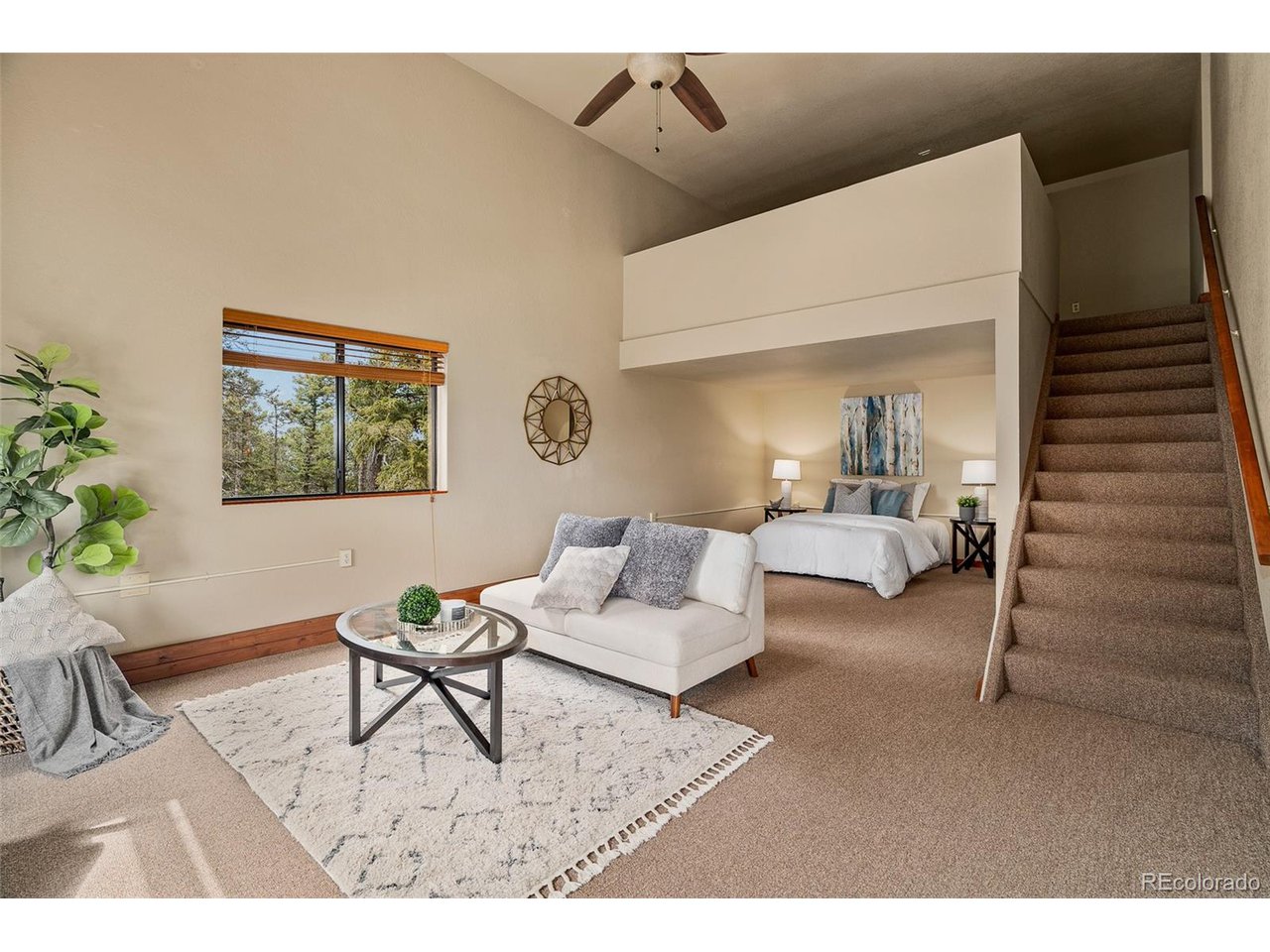 2755 Elk Ridge Divide Divide, CO 80814 - Photo 36 of 50 Bonus studio space with soaring ceilings up to loft, cozy fireplace, kitchenette, and en suite
