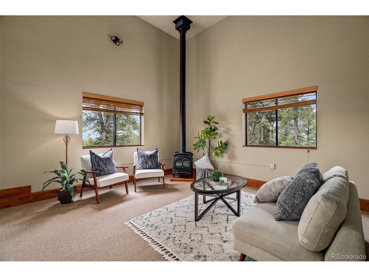 2755 Elk Ridge Divide Divide, CO 80814 - Photo 37 of 50 Bonus studio space with soaring ceilings up to loft, cozy fireplace, kitchenette, and en suite