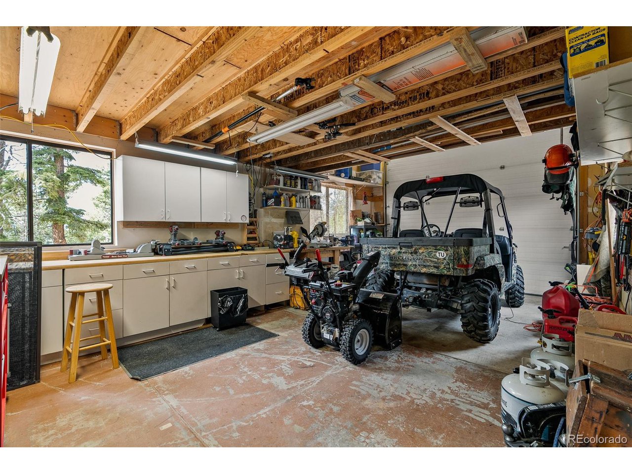 2755 Elk Ridge Divide Divide, CO 80814 - Photo 41 of 50 Workshop, loft, and storage space attached to the garage can be converted to RV parking