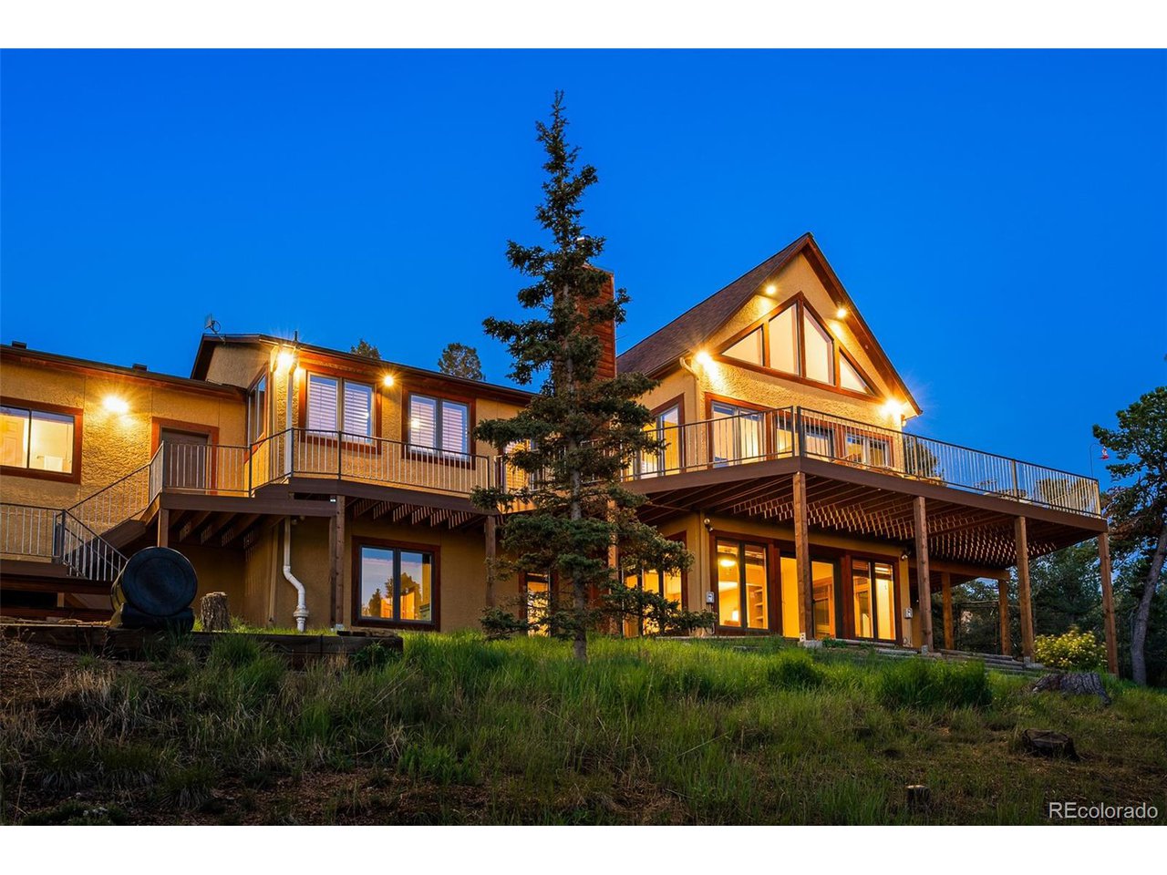 2755 Elk Ridge Divide Divide, CO 80814 - Photo 45 of 50 View of back house at night