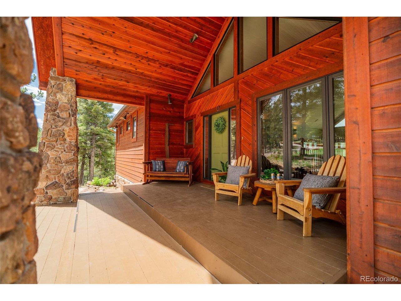 2755 Elk Ridge Divide Divide, CO 80814 - Photo 8 of 50 Large covered front deck