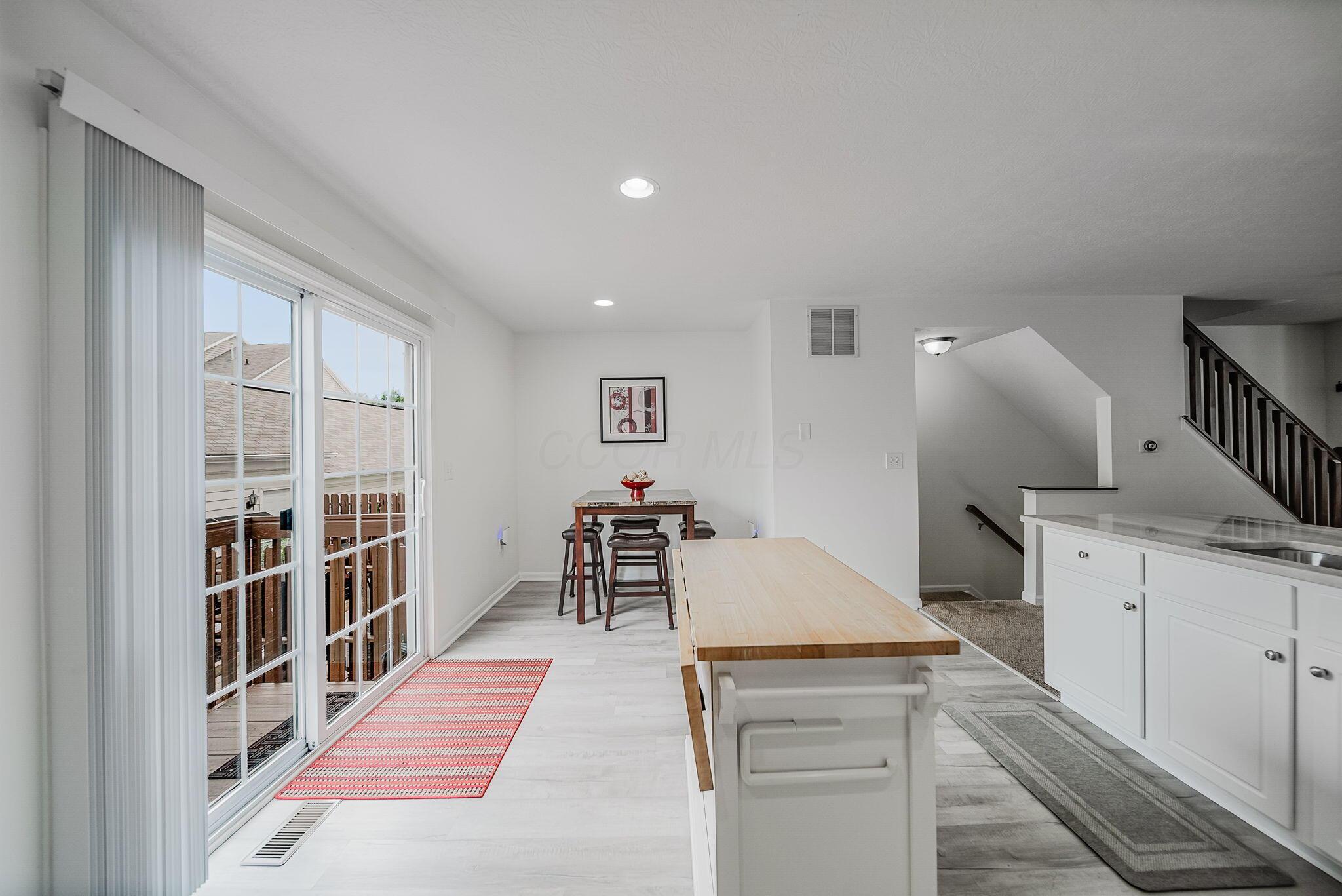 6186 Needletail Road, Unit 66 Columbus, OH 43230 - Photo 10 of 48 Kitchen island will convey with the property to give you even more prep space and storage!