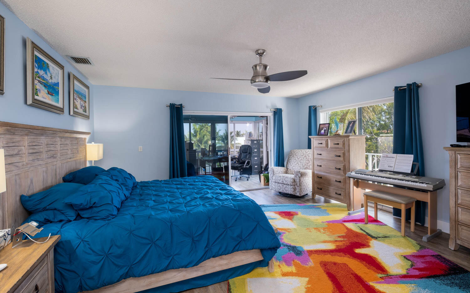 16 Corrine Place Key Largo, FL 33037 - Photo 19 of 50 a bedroom with a bed furniture and a flat screen tv