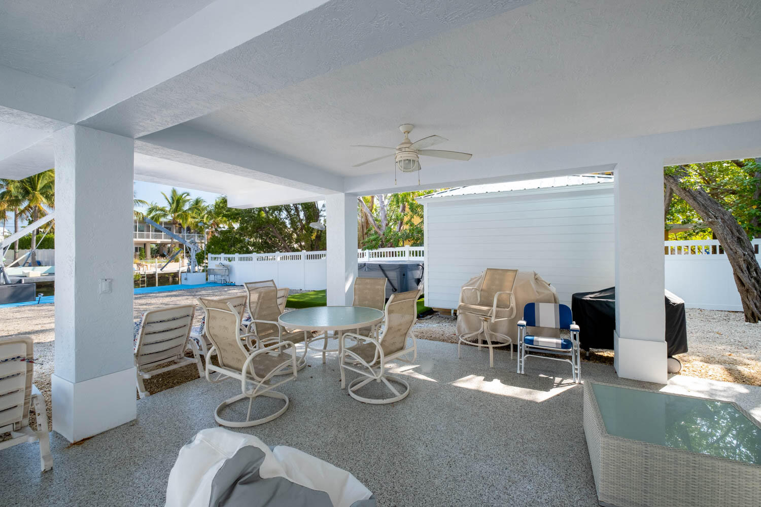 16 Corrine Place Key Largo, FL 33037 - Photo 37 of 50 a dining room with furniture water view and a floor to ceiling window
