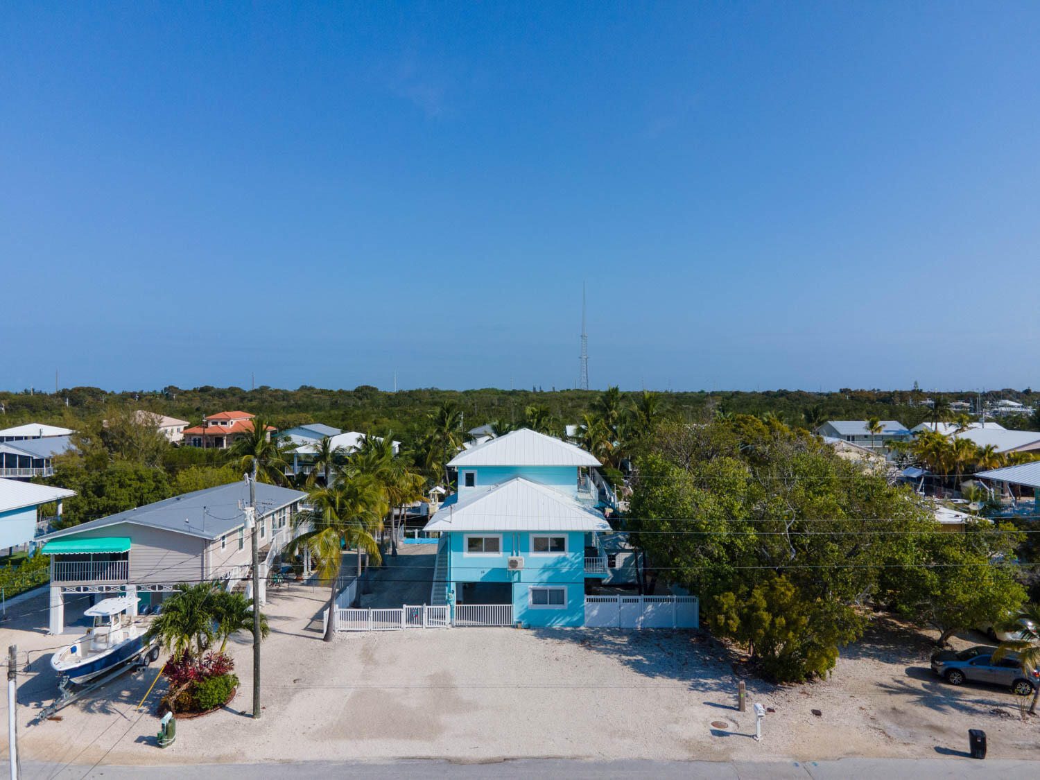 16 Corrine Place Key Largo, FL 33037 - Photo 4 of 50 an aerial view of a house with a yard and lake view