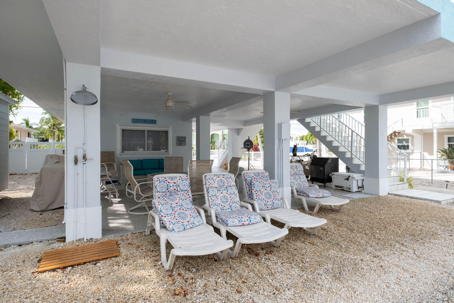 16 Corrine Place Key Largo, FL 33037 - Photo 41 of 50 a view of a livingroom with furniture and floor to ceiling window