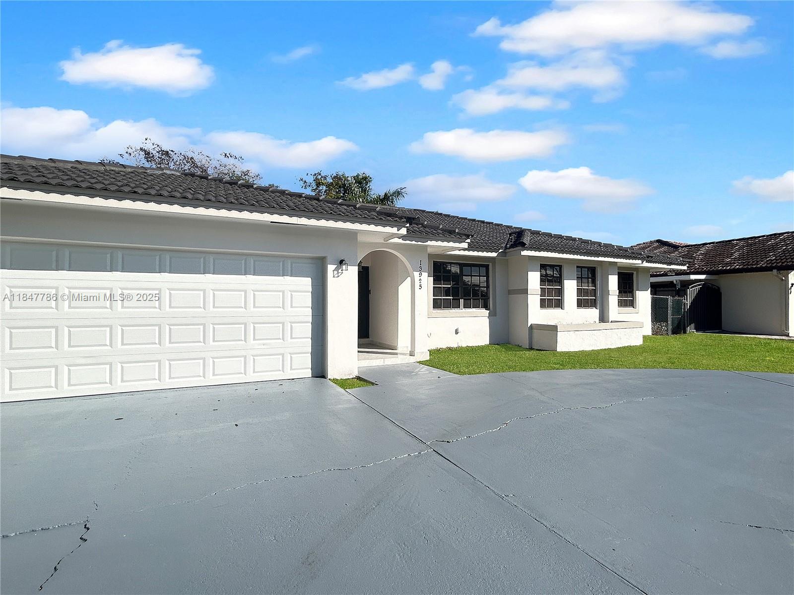 13925 Southwest 26th Terrace Miami, FL 33175 - Photo 3 of 36 front view of a house with a ocean view