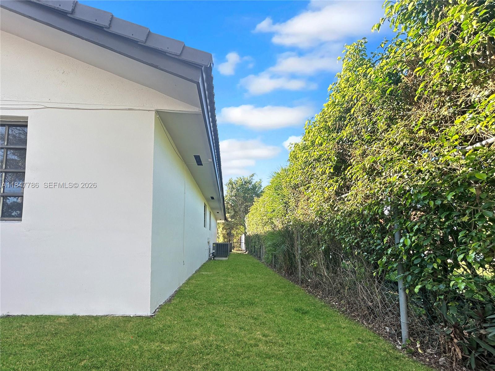 13925 Southwest 26th Terrace Miami, FL 33175 - Photo 41 of 42 a view of a back yard from a backyard