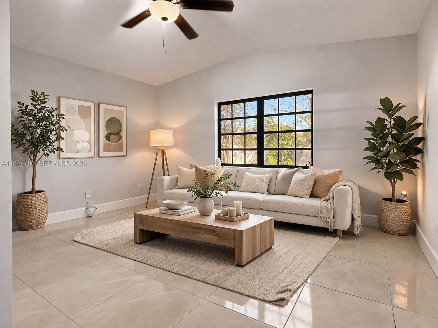 13925 Southwest 26th Terrace Miami, FL 33175 - Photo 5 of 42 a living room with furniture